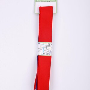 May include: Red collar cuffs rib trim, with the text "Collar Cuffs Rib Trim" and "Bordure c&ocirc;tel&eacute;e aux poignets du col". The trim is packaged on a white and green card. The trim is approximately 2 inches wide.
