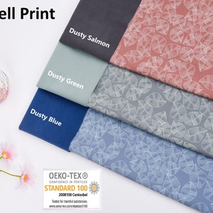 May include: Four swatches of soft shell fabric in dusty blue, dusty green, dusty salmon, and gray with a white leaf pattern. The fabric is certified Oeko-Tex Standard 100.