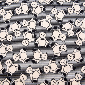 May include: Black and white fabric with a repeating pattern of teddy bears wearing bow ties. The bears are outlined in black and have a white interior.