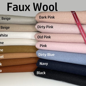 May include: A stack of faux wool fabric swatches in various colors, including light beige, dark beige, off white, creme, stone, camel, brick, terra, dark pink, dirty pink, old pink, pink, dirty blue, navy, and black. The fabric swatches are arranged in a vertical stack, with the lightest colors at the top and the darkest colors at the bottom. The fabric swatches are labeled with their respective colors.