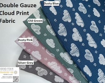 May include: Four fabric swatches with a white cloud and star print. The swatches are in dusty blue, old green, dusty pink, and silver grey. The fabric is double gauze and has the Oeko-Tex Standard 100 certification.