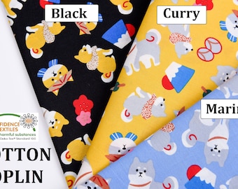 May include: Three cotton poplin fabric swatches with a repeating pattern of cartoon dogs wearing traditional Japanese clothing. The swatches are labeled "Black", "Curry", and "Marina" and are displayed on a white background. The text "CONFIDENCE IN TEXTILES Tested for harmful substances according to Oeko-Tex Standard 100 COTTON POPLIN" is visible in the lower left corner.