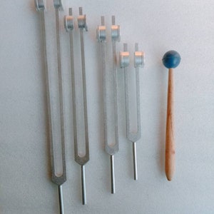 4 pc weighted otto  tuning fork set with mallet activator and pouch for sound healing kit for use meditation relaxation