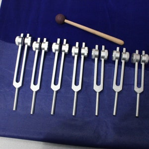 7 pc  weighted chakra tuning fork set with mallet activator and pouch for sound healing kit for use meditation relaxation