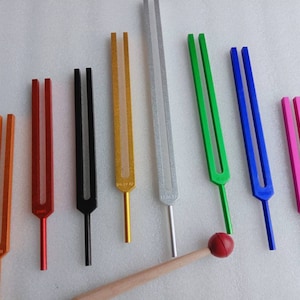 9 pc chakra tuning fork set with mallet activator and pouch for sound healing kit for use meditation relaxation