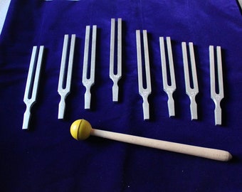 8 pc harmonic tuning fork set  with mallet activator and pouch for sound healing kit for use meditation tune fork