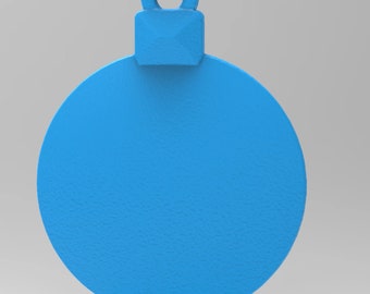 May include: A solid blue Christmas ornament with a textured surface. The ornament has a circular shape with a small square top and a loop for hanging. The background is a light gray.