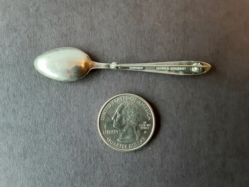 Silver spoon pin