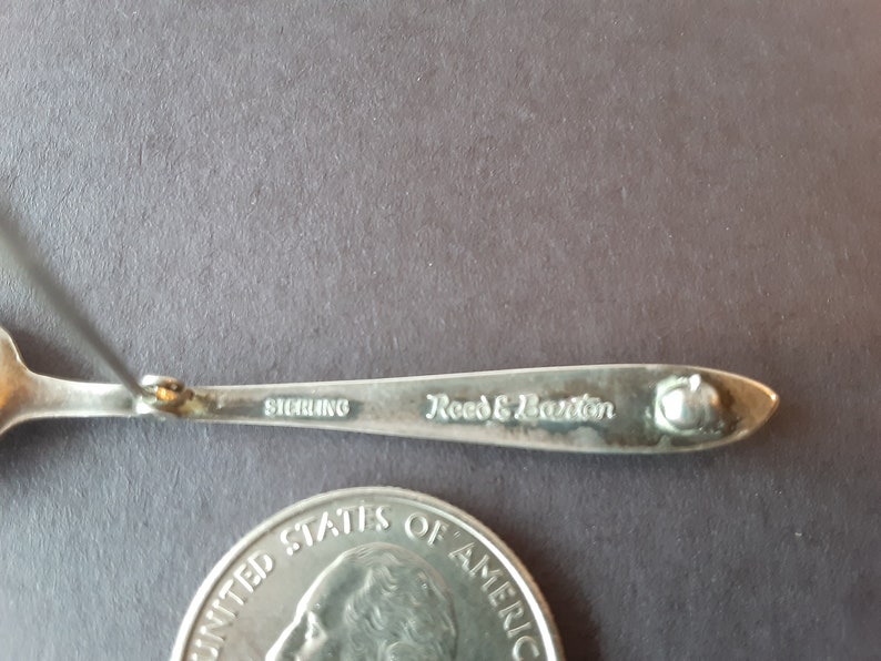 Silver spoon pin