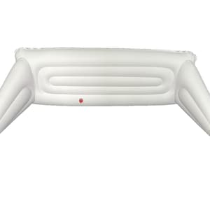 May include: White inflatable car bed with a red valve. The bed has three air chambers and two inflatable wings.