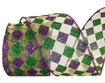May include: A roll of decorative ribbon with a harlequin pattern. The ribbon features a sheer, gold-toned base overlaid with glittery green, purple, and white diamond shapes. The edges are trimmed with a matching purple border.