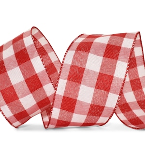 May include: A roll of red and white checkered ribbon. The ribbon is a classic gingham pattern, with a repeating square design. The edges are finished with a decorative stitched border. The ribbon is ideal for crafts, gift wrapping, and decorations.