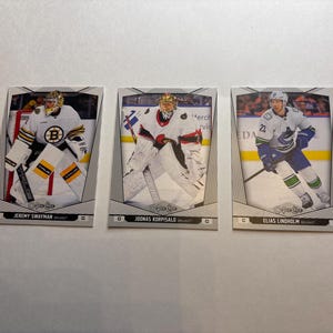 Pacote de cartas boston bruins o-pee-chee e upper deck 2024-25