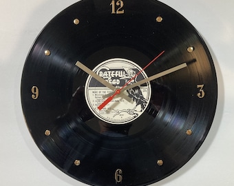 Grateful Dead Record Clock (Wake Of The Flood) - 12” wall clock created using the actual Grateful Dead vinyl record.