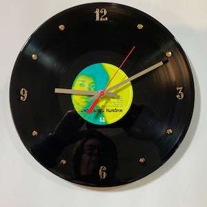 Jimi Hendrix Record Clock (Experience Hendrix) - created with the actual Jimi Hendrix 12&quot; LP album. Classic Hendrix songs!