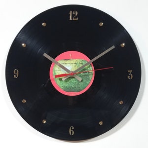 The Beatles Record Clock (Beatles, 1962-1966) - 12” wall clock created with the authentic Beatles vinyl record