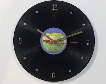 The Beatles Record Clock (1967 - 1970) - 12" Wall Clock created by using their authentic vinyl album.