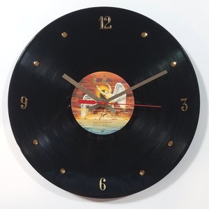 Led Zeppelin Record Clock (The Song Remains The Same). 12” wall clock handmade using the authentic Led Zeppelin vinyl record.