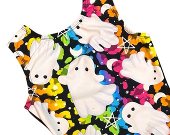 May include: A black leotard with a rainbow and white ghost print. The leotard has a scoop neck and sleeveless design.