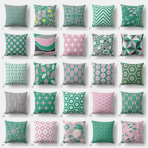 May include: A collection of 25 decorative throw pillows with various geometric and floral patterns. The pillows feature shades of green, pink, and white, with designs including polka dots, leaves, and cross patterns. The pillows are square-shaped.