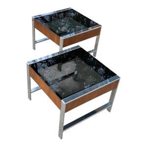 May include: A set of three ceramic mugs with a speckled, matte finish. Each mug features a different color: light blue, cream, and gray. The mugs have a simple, modern design and a comfortable handle.