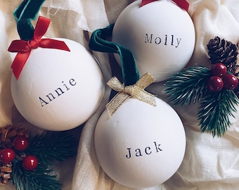 Handmade personalised ceramic Christmas baubles