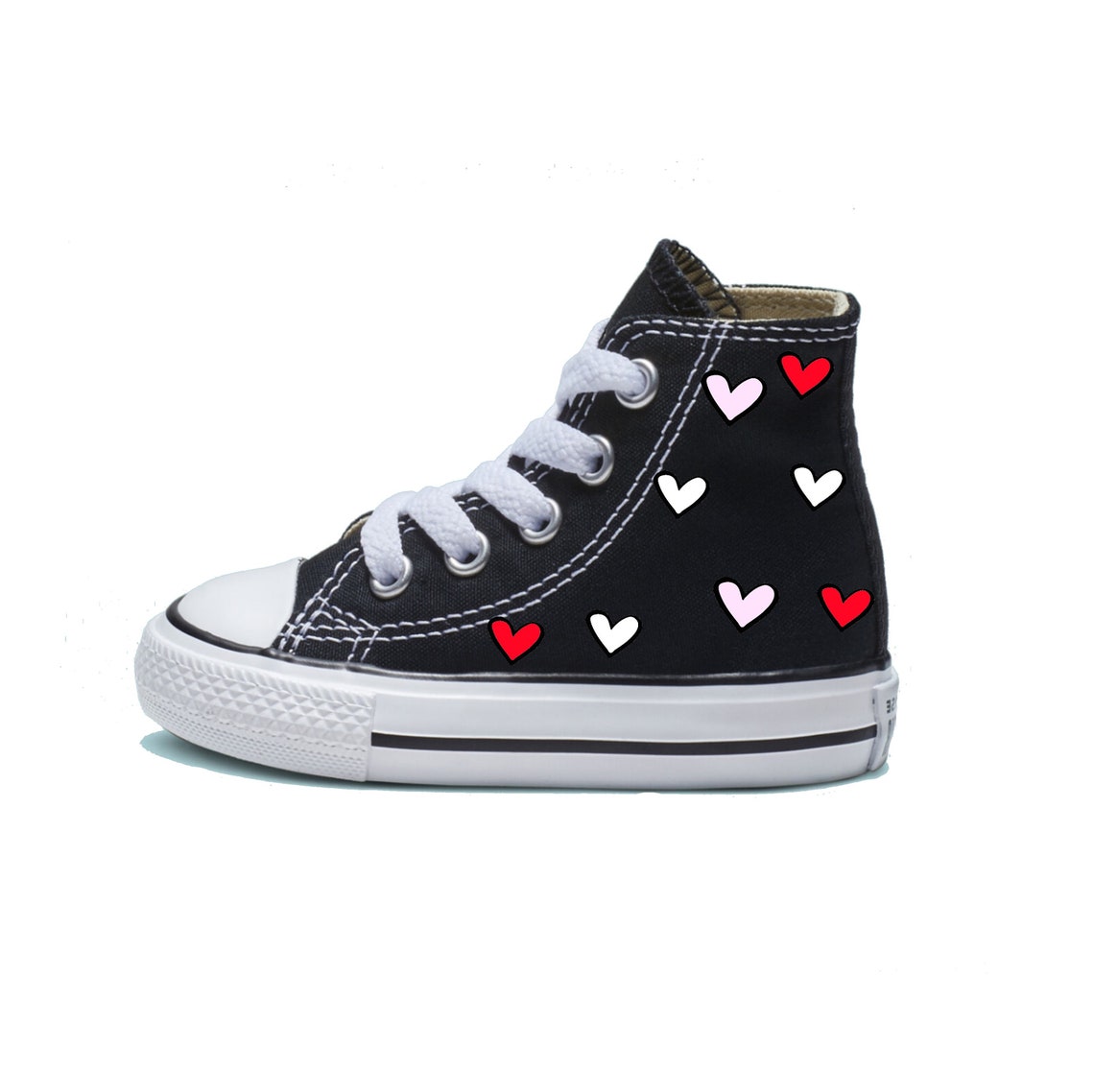 converse with a heart on it