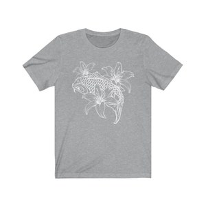 May include: A gray t-shirt with a white outline of a koi fish swimming through lilies.