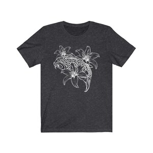 May include: A dark heather grey t-shirt with a white outline of a koi fish swimming through lilies.
