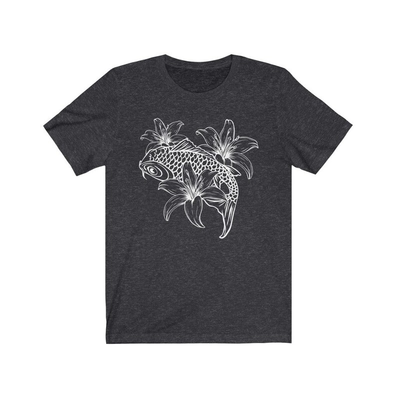May include: A dark heather grey t-shirt with a white outline of a koi fish swimming through lilies.