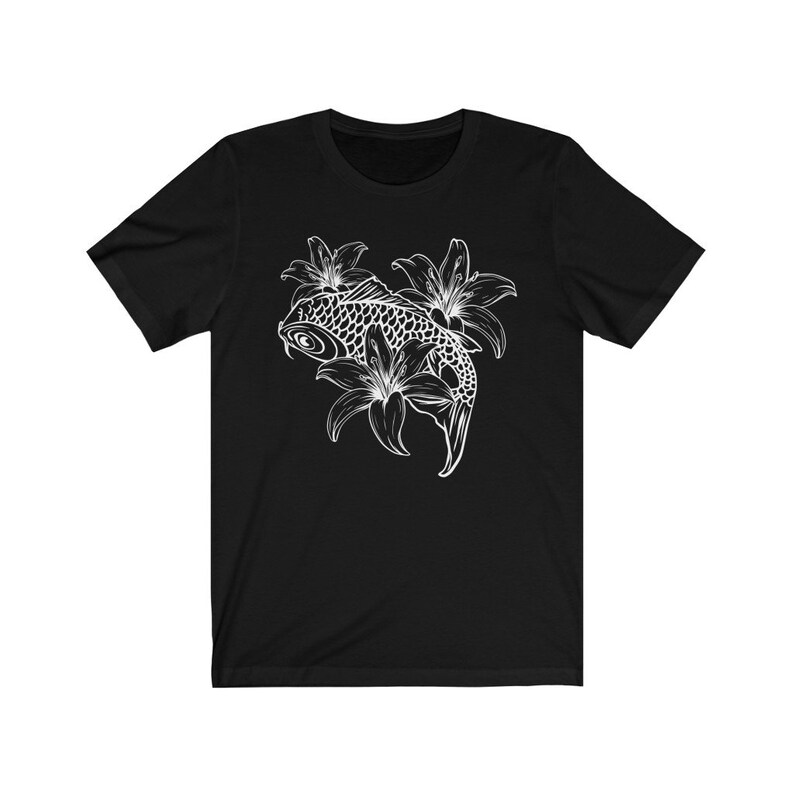 May include: Black t-shirt with a white outline of a koi fish swimming through lily flowers.