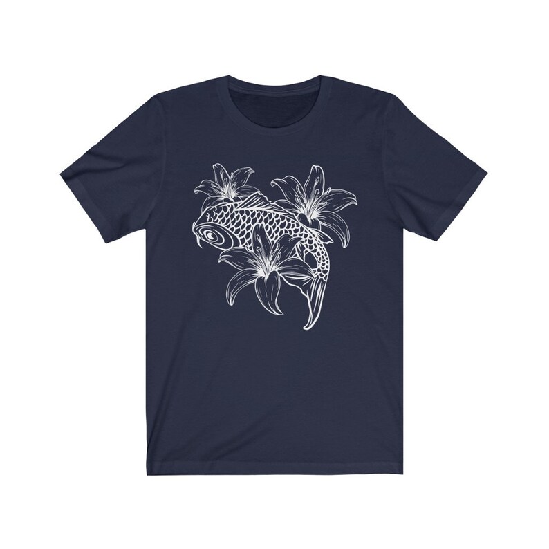 May include: A navy blue t-shirt with a white outline of a koi fish swimming through lilies.