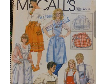 McCalls  8231 Bib Apron Pattern, Ruffle Trim, Three Lengths, Front Pockets, Shoulder Straps, Waistband, Tie Back, All Sizes