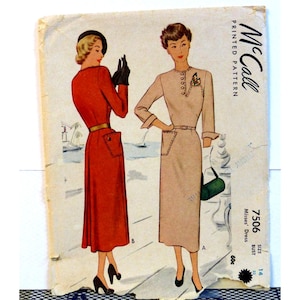 May include: Vintage McCall's printed pattern with illustrations of two dresses. One is red with a gold belt, the other is beige with a matching belt. The pattern includes the text "McCall" and "Printed Pattern".