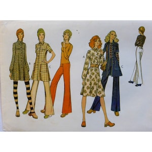 May include: A vintage sewing pattern showcasing five distinct outfit designs for women. The designs include a floral print dress, a checked shirt dress, a plain coloured shirt dress, a long-sleeved shirt with trousers, and a striped shirt with trousers. The pattern is labelled with letters A, B, and C.