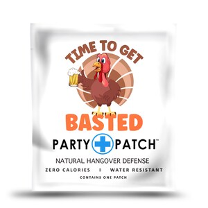 May include: A white package with a cartoon turkey holding a beer and the text "TIME TO GET BASTED PARTY PATCH" with a blue plus sign between the words "PARTY" and "PATCH". The package also includes the text "NATURAL HANGOVER DEFENSE", "ZERO CALORIES", "WATER RESISTANT", and "CONTAINS ONE PATCH".