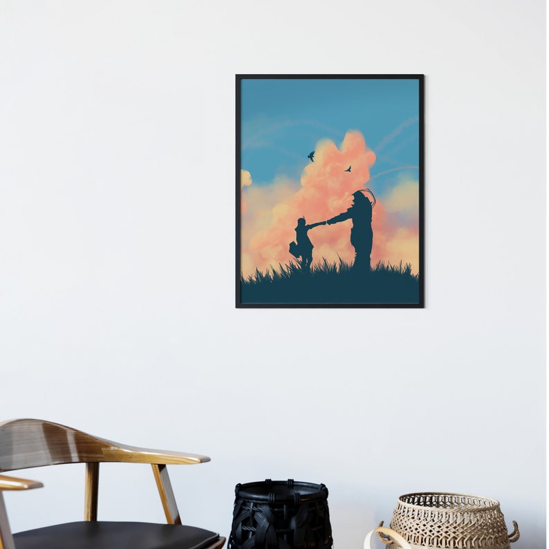 May include: A framed print of a silhouette of two people holding hands and walking in a field with a large pink cloud in the sky.