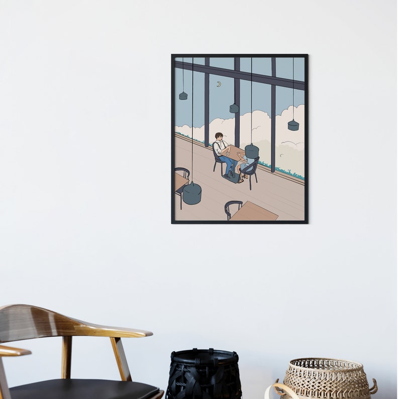 May include: A black framed illustration of a couple sitting at a table in a cafe with a view of clouds and a crescent moon. The cafe has large windows and hanging light fixtures.