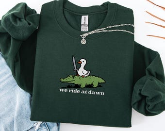 We Ride at Dawn Embroidered Sweatshirt,Embroidered Silly Goose Sweatshirt,Funny Ren Faire Shirt, Cute Animal Shirt,Goose Cottagecore Shirt