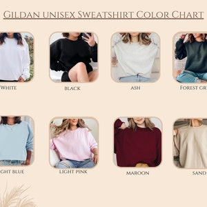 Peut inclure: Nuancier de couleurs montrant diff&eacute;rentes couleurs de sweat-shirts unisexes Gildan. Les couleurs incluent le blanc, le noir, le gris cendr&eacute;, le vert for&ecirc;t, le bleu clair, le rose clair, le bordeaux et le sable.