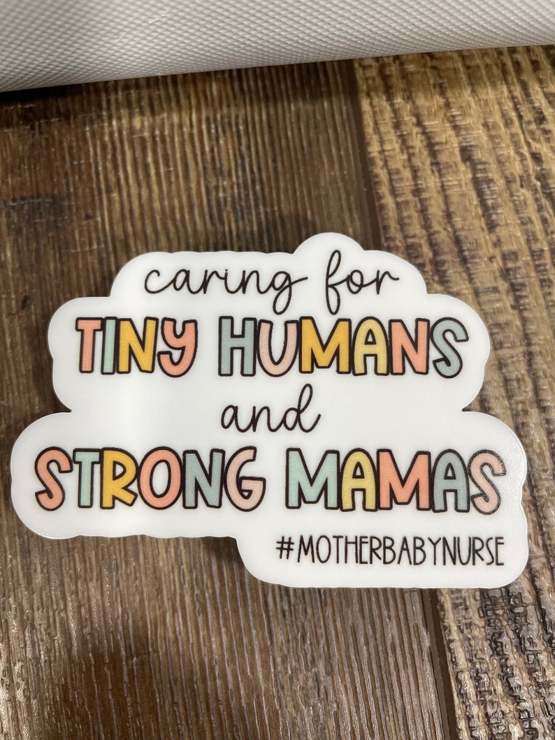 May include: A white sticker with the text "caring for tiny humans and strong mamas #motherbabynurse" in rainbow colours.