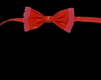 Cherry Cherry, pet bow tie, red with pink cherries and hot pink pompom trim.