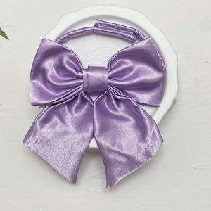 Lilac purple, satin Sailors Bow. Available for dogs and cats. Cat sizes available with attached collar, or over the collar.