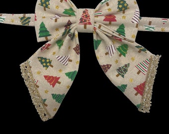 Christmas tree farm, pet sailors bow tie, red, green & gold Christmas trees with sparkly gold stars and sparkly gold trim.