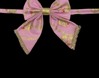 Best Friends, pet sailors bow tie, pink with gold charm best friends charm bracelets. With gold metallic trim and gold sparkly center.