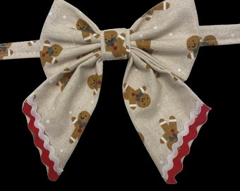 Dreaming of Gingerbread, pet sailors bow tie, traditional gingerbread with red and white ricrac trim.