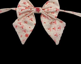 Love Letters, pet sailors bow tie, white with pink love letters. With white metallic ricrac trim and rose gem center.