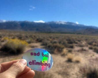 sad boi climbing holographic (iridescent) sticker