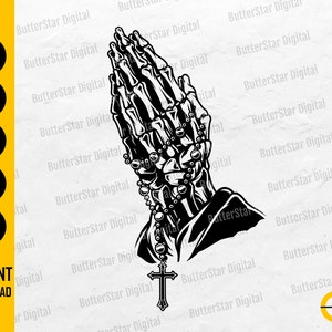 May include: Black and white illustration of skeletal hands in prayer, holding a rosary with a cross pendant. The image includes text for SVG, DXF, PNG, EPS, and AI file formats, along with "INSTANT DOWNLOAD".