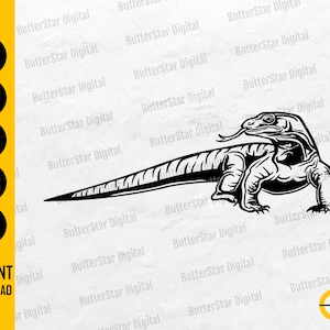 May include: A monochrome illustration of a Komodo dragon with its tongue out. The image includes the text "SVG, DXF, PNG, EPS, AI" and "INSTANT DOWNLOAD". Ideal for digital design projects and craft.